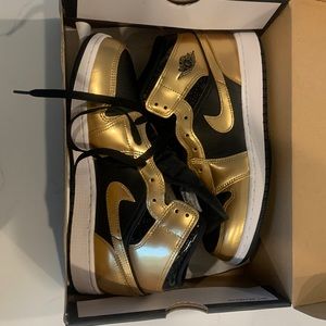 Brand New black and gold Air Jordan shoes